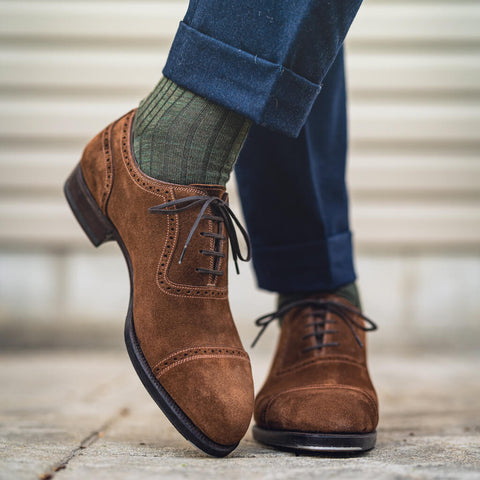 olive dress socks with navy pants and brown